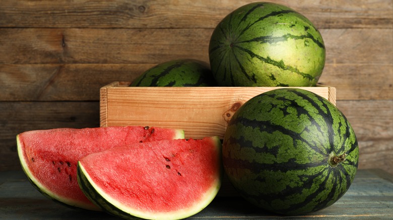 Whole and cut watermelon