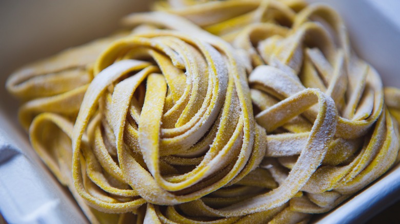 Container of frozen tagliatelle pasta