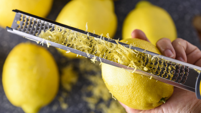 zesting lemons with microplane