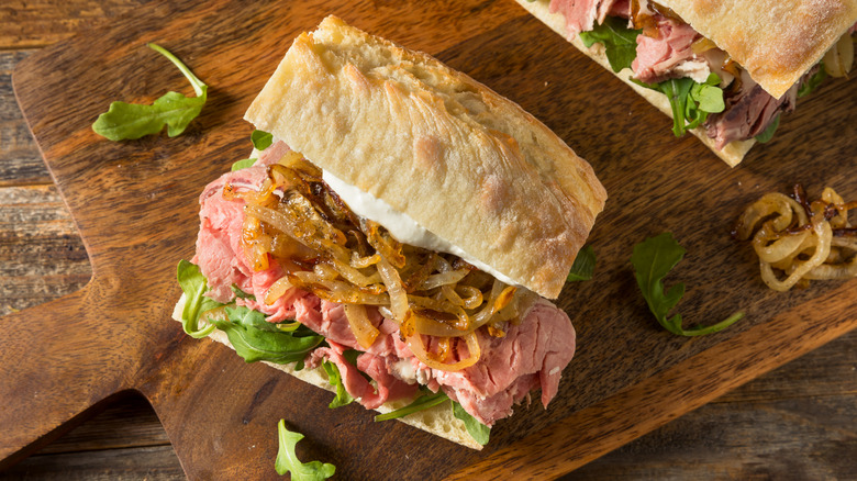 A prime rib sandwich on a baguette.