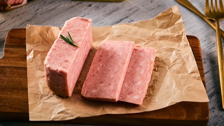 sliced spam on cutting board