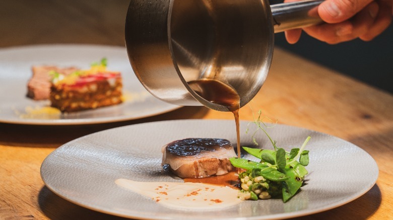Dish being prepared at a restuarant