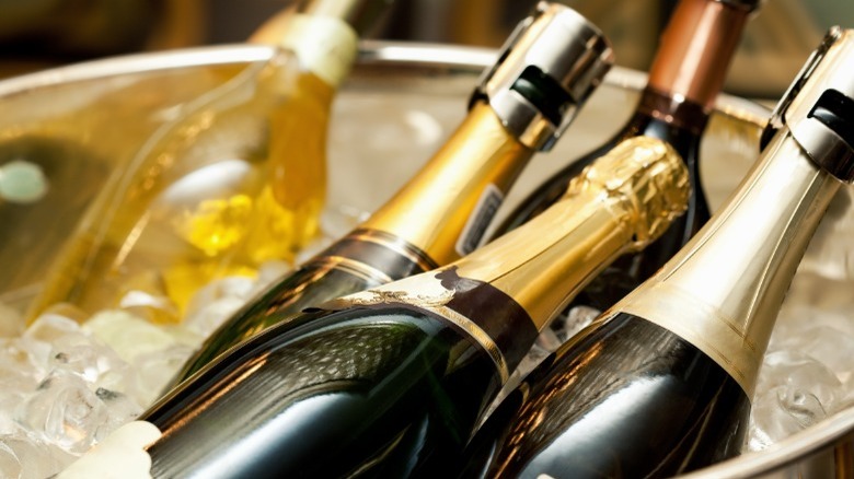 Bottles of champagne in an ice bucket 