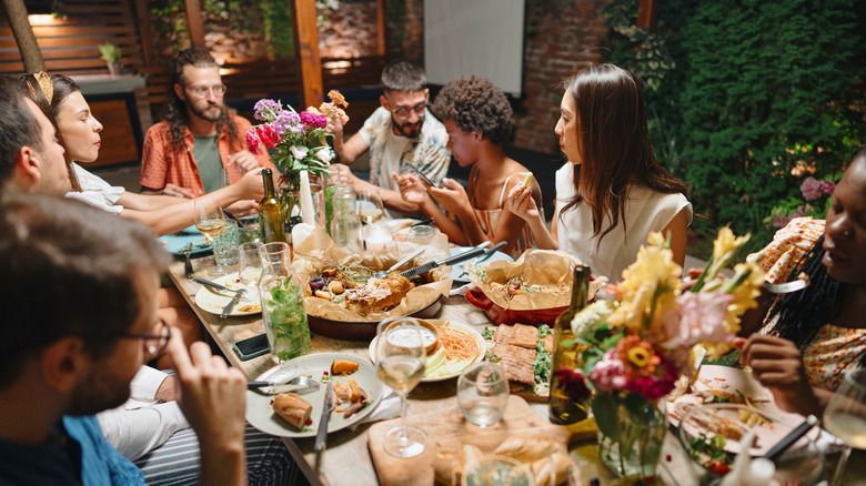 Guests at a dinner party