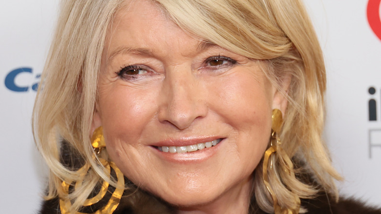 Martha Stewart wearing gold earrings