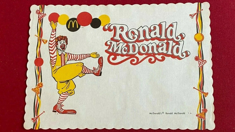 A placemat featuring the 1967 Ronald McDonald mascot.