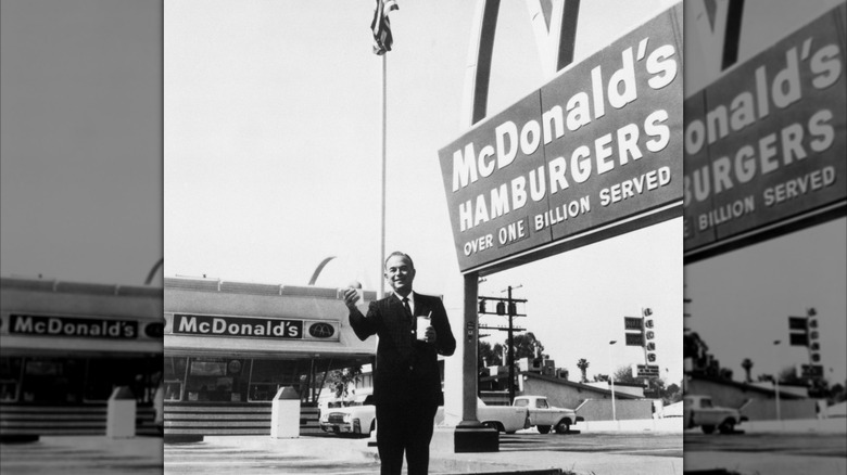 Ray Kroc outside a McDonald's