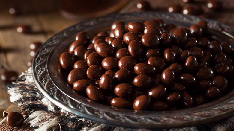 a bowl of chocolate covered espresso beans