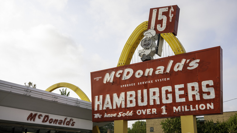 The original McDonald's restaurant, displaying the original "Speedee" character and golden arch design.