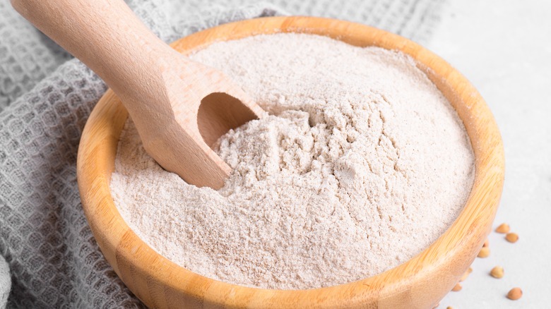 flour scoop in bowl