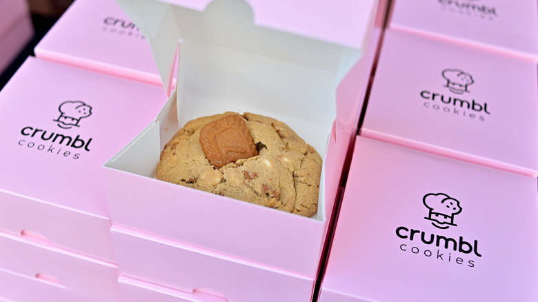 Stack of Crumbl cookie boxes