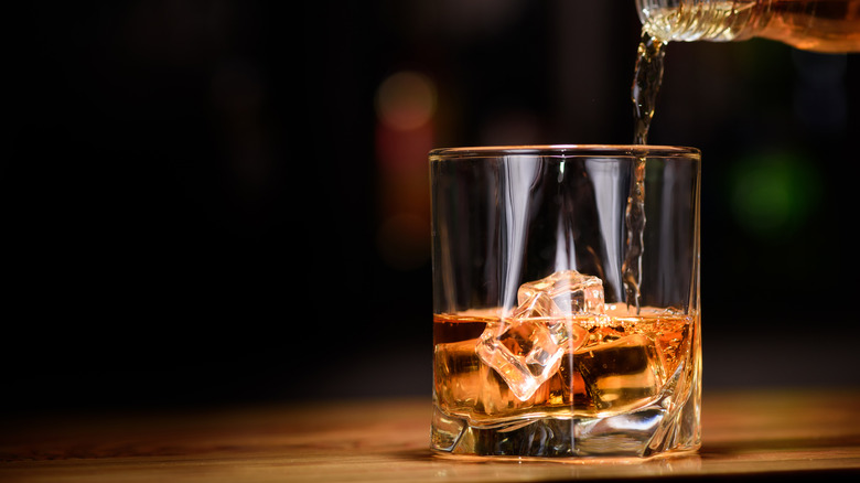 glass of whiskey with ice