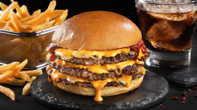 Triple cheeseburger with thin patties