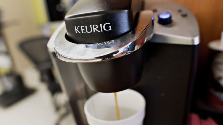 Coffee pouring out of Keurig machine