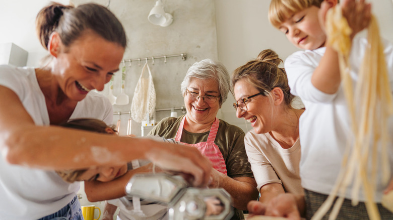 Family making pasta