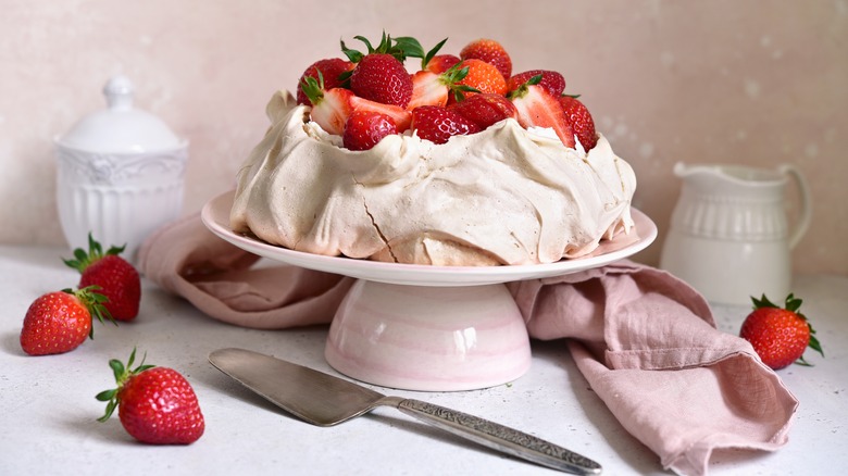 A pavlova with strawberries