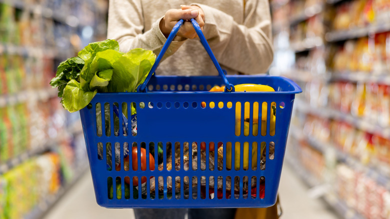 Customer using a shopping basket