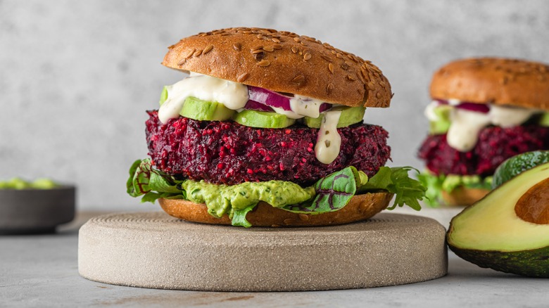 Beet burger on stand