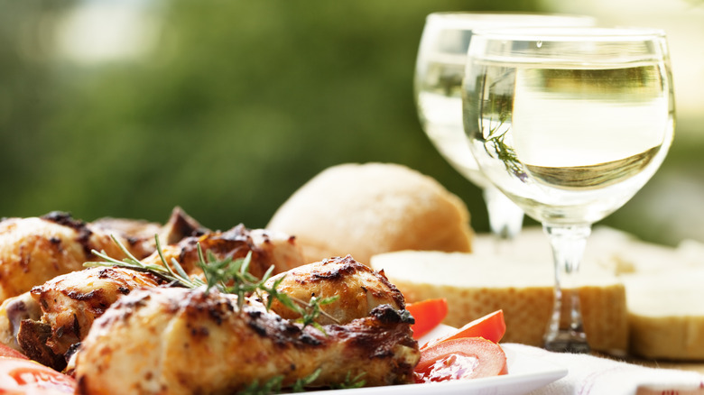 White wine alongside roasted chicken legs