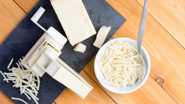 Rotary cheese grater and cheese