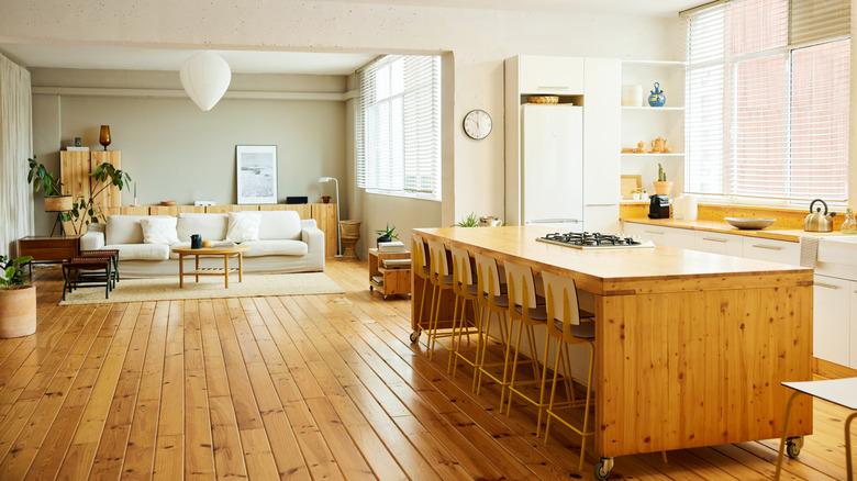 Chairs line up behind a homey kitchen island