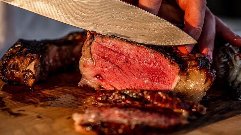 premium steak being sliced