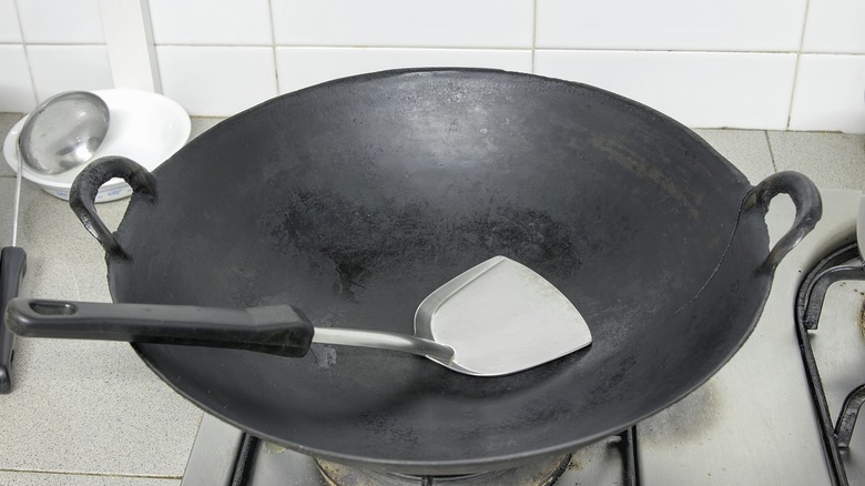 Wok with metal spatula