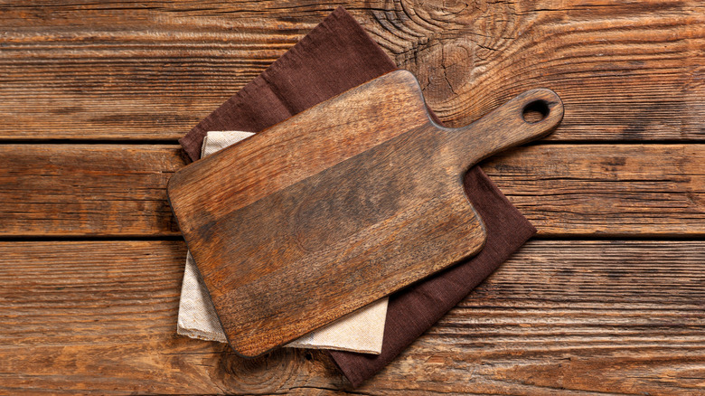Several cutting boards on top of each other.