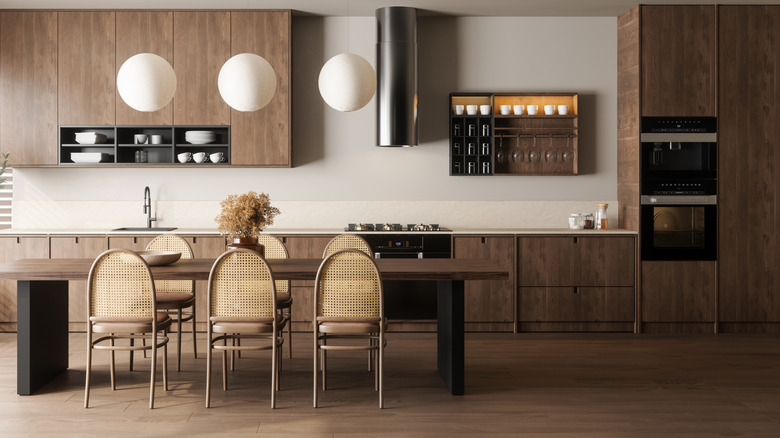 A modern, clean kitchen with wooden cabinets
