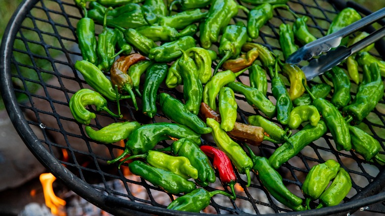 shishito peppers being roasted