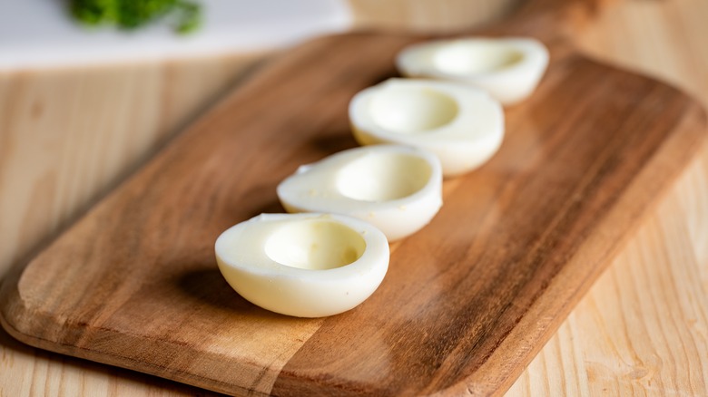 A plate of hard-boiled eggs cut in half