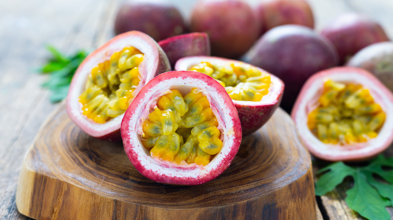 Sliced passion fruit on a wooden block