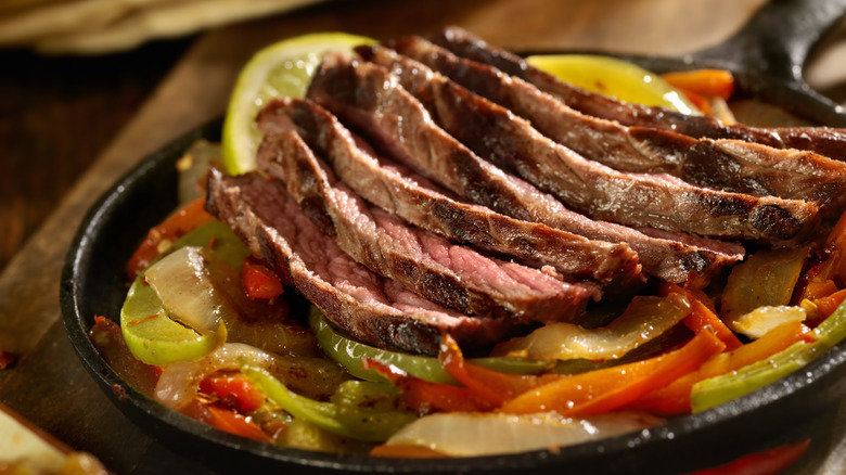 Steak fajitas in cast iron pan
