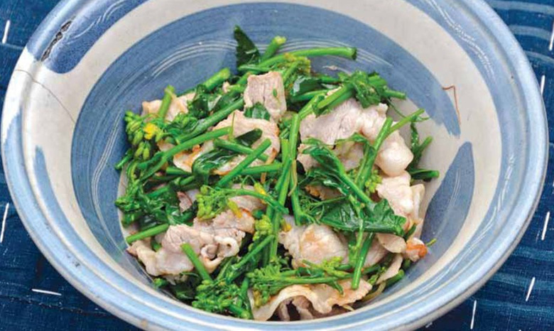Pork and flowering mustard stir-fry is one of the dishes featured in the cookbook.