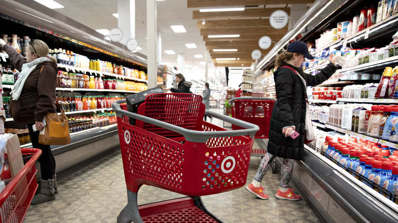 people shopping in refrigerated aisle at Target