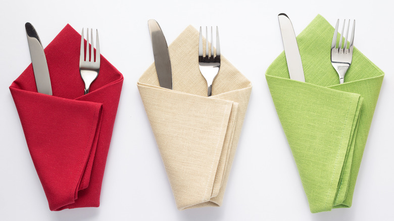 Folded dinner napkins with cutlery