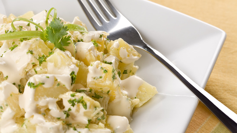 potato salad on plate with fork