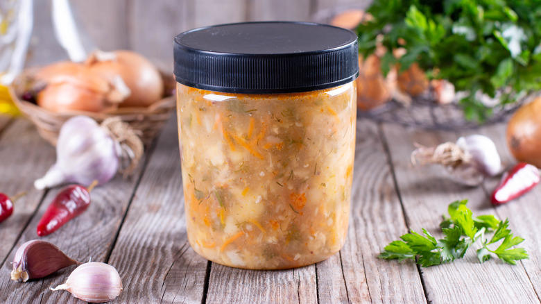 frozen soup in container with ingredients