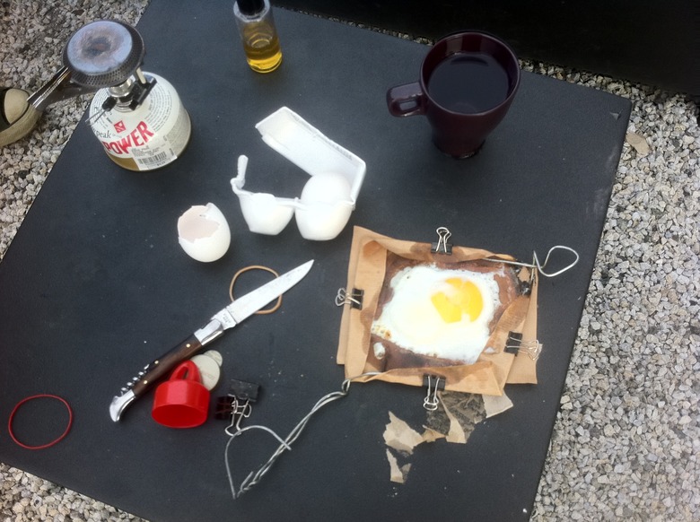 The aftermath of this weird science experiment involving frying an egg on a piece of paper.