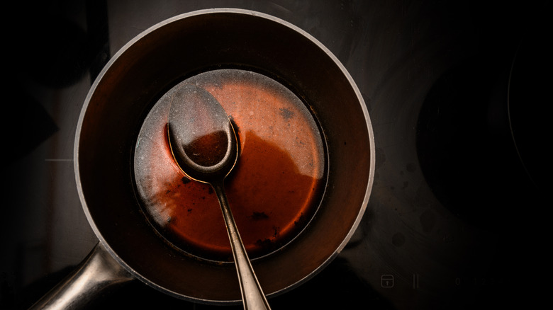 a reduced liquid in a saucepan