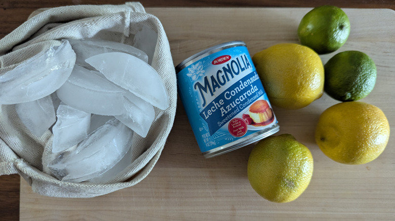 Ice, condensed milk, lemons, and limes.