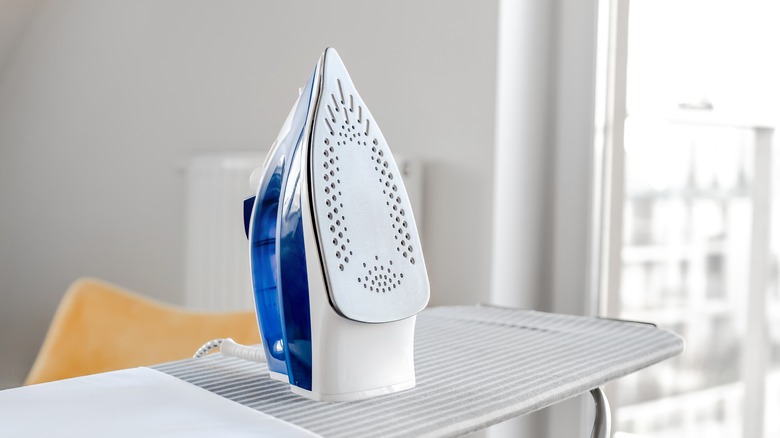 Iron on an ironing board