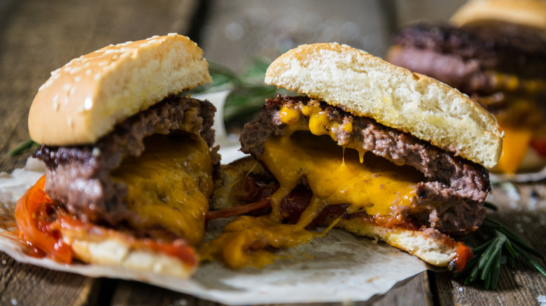 Juicy Lucy burger cut open with melted cheese
