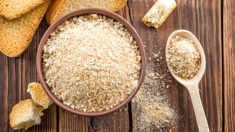 breadcrumbs in bowl and spoon