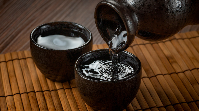 Sake being poured into cup