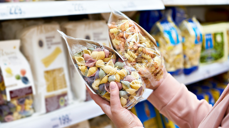 Choosing pasta at the grocery