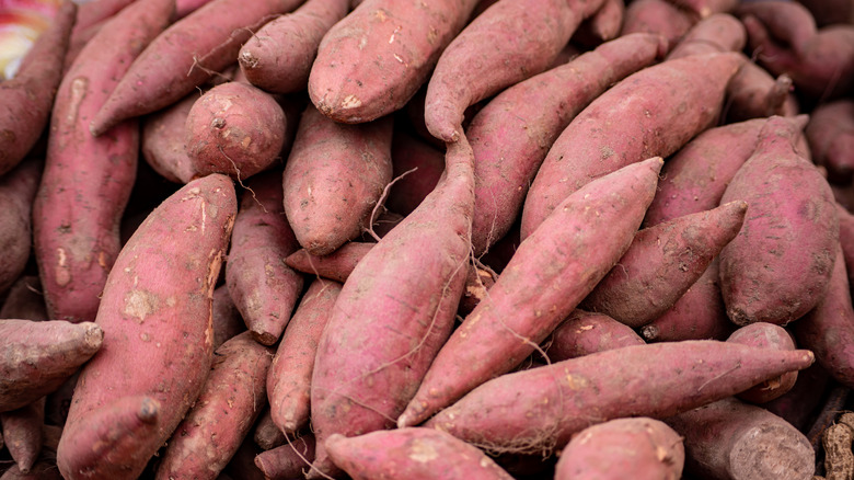 Stack of sweet potatoes at grocery store