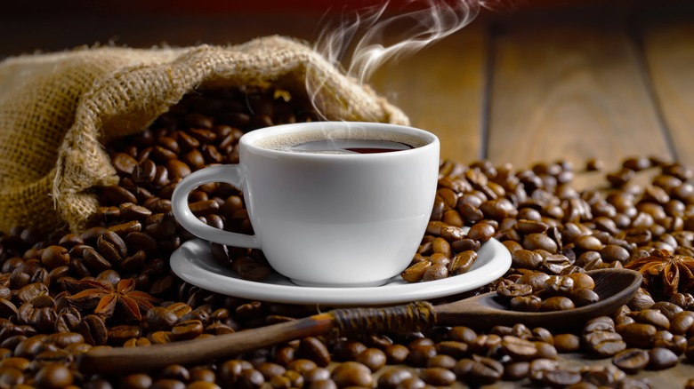 Cup of coffee and bag of coffee beans