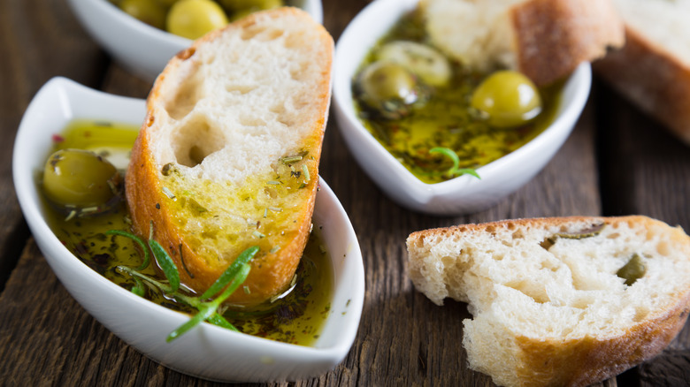 bread dipped in olive oil and herbs