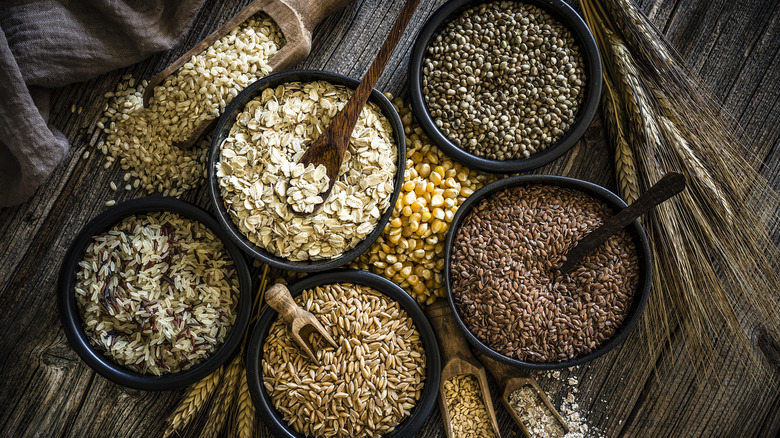 whole grains in scoops and bowls